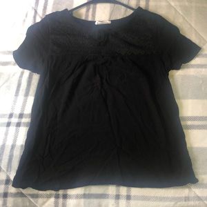 Black blouse it’s a kids size in XL